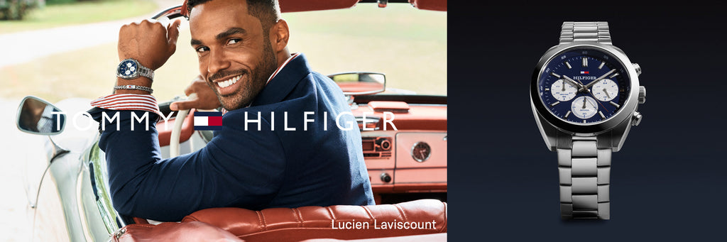 Model in old car wearing Tommy Hilfiger watch and bracelet
