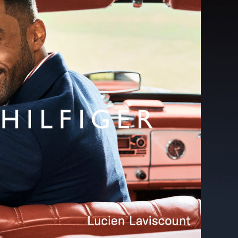 Model in old car wearing Tommy Hilfiger watch and bracelet